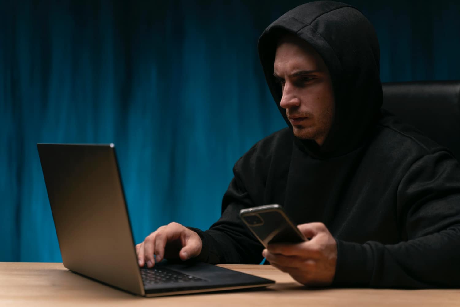 concerned-man-with-devices-medium-shot