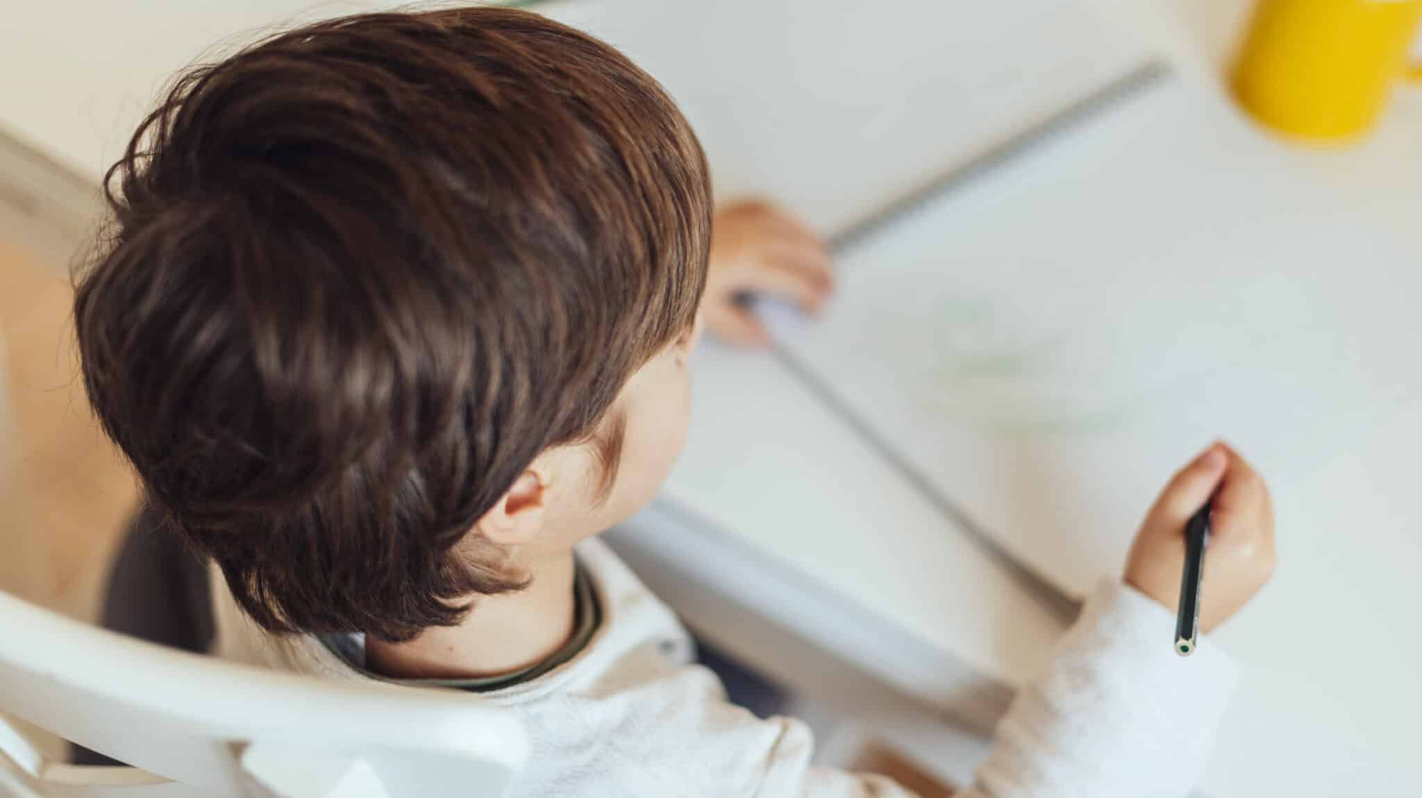 FREEPIK__kid-doing-homework